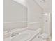 Bright bathroom featuring a walk-in shower and large mirror at 946 Redan Trce, Stone Mountain, GA 30088