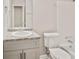 Bathroom features gray painted vanity and shower and tub combo at 946 Redan Trce, Stone Mountain, GA 30088