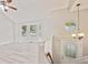Bright entryway featuring new floors, a decorative chandelier, and an octagon window at 946 Redan Trce, Stone Mountain, GA 30088