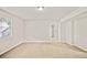 A bright living room with fresh paint and new carpet at 946 Redan Trce, Stone Mountain, GA 30088