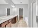 Bathroom with double sinks, vanity, shower and tub in view at 118 Hardy Water Dr, Lawrenceville, GA 30045
