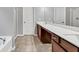 Bathroom features double sinks, vanity, and separate tub and shower at 118 Hardy Water Dr, Lawrenceville, GA 30045