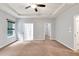 Open bedroom features a walk-in closet, carpet, neutral walls and a ceiling fan at 118 Hardy Water Dr, Lawrenceville, GA 30045