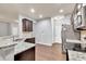 Kitchen featuring stainless steel appliances, granite countertops, and dark wood cabinetry at 118 Hardy Water Dr, Lawrenceville, GA 30045