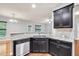 Kitchen with granite countertops, stainless steel appliances, and hardwood floors at 118 Hardy Water Dr, Lawrenceville, GA 30045