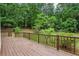 Wooden deck with wooded view at 1185 Wedgefield Sw Dr, Marietta, GA 30064
