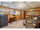 Basement with wood paneled walls and drop ceiling tiles at 1185 Wedgefield Sw Dr, Marietta, GA 30064