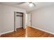 Bedroom with hardwood floors and a closet at 1185 Wedgefield Sw Dr, Marietta, GA 30064