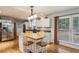 Modern kitchen featuring stainless steel appliances, white cabinets, and breakfast bar at 1185 Wedgefield Sw Dr, Marietta, GA 30064