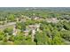 A beautiful aerial view captures the property, showing its location within a lush, wooded area at 1382 6Th Ave, Auburn, GA 30011