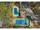 Overhead view showcasing the community pool and tennis court at 1603 Cumberland Ct, Smyrna, GA 30080