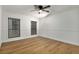 Bright, spacious bedroom with modern ceiling fan, laminate floors, and updated trim offers a serene and inviting space at 1603 Cumberland Ct, Smyrna, GA 30080