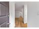 Bright entryway features sleek hardwood flooring and neutral, freshly painted walls at 1603 Cumberland Ct, Smyrna, GA 30080