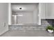 Bright kitchen features a breakfast bar overlooking the adjacent dining area at 1603 Cumberland Ct, Smyrna, GA 30080