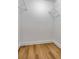 An empty walk-in closet with laminate flooring and a wire shelf offers ample room for storage and organization at 1603 Cumberland Ct, Smyrna, GA 30080