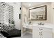 Spacious bathroom featuring a glass enclosed shower with decorative tile and a large vanity at 411 Hickory Fairway Ct, Woodstock, GA 30188