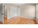 Bedroom with hardwood floors, ample closet space and access to a bathroom at 411 Hickory Fairway Ct, Woodstock, GA 30188
