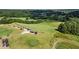 Picturesque golf course featuring well-manicured greens and rows of golf carts at 411 Hickory Fairway Ct, Woodstock, GA 30188