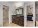 Spacious bathroom features a dark wood vanity and tile floors at 1078 Shady Valley Ne Pl, Atlanta, GA 30324