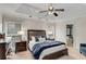 Bedroom features a ceiling fan and a view of the bathroom at 1078 Shady Valley Ne Pl, Atlanta, GA 30324