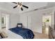 Bedroom features a dark wood dresser and is naturally lit at 1078 Shady Valley Ne Pl, Atlanta, GA 30324