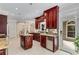 Open kitchen with granite countertops, stainless steel appliances, custom cabinets, and island workstation at 1078 Shady Valley Ne Pl, Atlanta, GA 30324