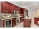 Updated kitchen featuring stainless steel appliances, granite countertops, custom cabinetry, and wine fridge at 1078 Shady Valley Ne Pl, Atlanta, GA 30324