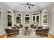 Bright sitting area with hardwood floors, comfortable seating, and large windows at 1078 Shady Valley Ne Pl, Atlanta, GA 30324