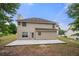 Spacious backyard featuring a patio, perfect for outdoor entertaining and relaxation at 1486 Rogers Crossing Dr, Lithonia, GA 30058