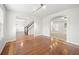 Bright living room with hardwood floors and arched doorways at 1486 Rogers Crossing Dr, Lithonia, GA 30058