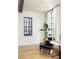 Cozy sitting area features a black framed window, stylish chair, and views from the window at 77 Delmont Ne Dr, Atlanta, GA 30305