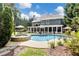 Spacious backyard featuring a sparkling pool, spa, screened porch and lush landscaping at 1501 Laurelhill Drive Southwest Dr, Lawrenceville, GA 30044