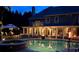 Inviting backyard features a sparkling pool, hot tub, and relaxing patio with fire features, perfect for outdoor entertaining at 1501 Laurelhill Drive Southwest Dr, Lawrenceville, GA 30044