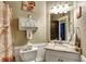 Cozy bathroom with granite countertops, featuring stylish storage, a toilet, and a shower at 1501 Laurelhill Drive Southwest Dr, Lawrenceville, GA 30044
