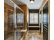 Elegant bathroom with a glass door shower, tile flooring, and a cozy window seat niche at 1501 Laurelhill Drive Southwest Dr, Lawrenceville, GA 30044