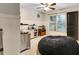 Inviting bedroom featuring a large beanbag chair, and a charming display of aquariums at 1501 Laurelhill Drive Southwest Dr, Lawrenceville, GA 30044