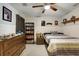 Bright bedroom with a ceiling fan, and a well-organized bookshelf at 1501 Laurelhill Drive Southwest Dr, Lawrenceville, GA 30044