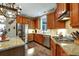 Modern kitchen featuring stainless steel appliances, granite countertops, and ample cabinet space at 1501 Laurelhill Drive Southwest Dr, Lawrenceville, GA 30044