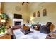 Inviting living room features a brick fireplace and comfortable leather seating at 1501 Laurelhill Drive Southwest Dr, Lawrenceville, GA 30044