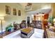 Bright living room with fireplace, hardwood floors, and access to an open kitchen at 1501 Laurelhill Drive Southwest Dr, Lawrenceville, GA 30044
