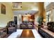 Open concept living area with a fireplace and hardwood floors leading to the kitchen at 1501 Laurelhill Drive Southwest Dr, Lawrenceville, GA 30044
