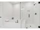 Modern bathroom features a tub with tile surround and a glass-enclosed shower at 2445 Hidden Creek Rd, Kennesaw, GA 30152