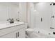 Stylish bathroom with white cabinets, a modern shower with glass door, and sleek fixtures at 2445 Hidden Creek Rd, Kennesaw, GA 30152