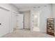 Bedroom featuring carpet flooring and access to other rooms at 2445 Hidden Creek Rd, Kennesaw, GA 30152