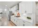 Bright kitchen with stainless steel appliances, white countertops, and an efficient layout at 2445 Hidden Creek Rd, Kennesaw, GA 30152