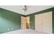 Spacious bedroom has double closets and carpet, and connects to the hallway at 615 Lovinggood Trl, Woodstock, GA 30189