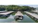 Aerial view of boat slips, featuring multiple boat docks with numerous boats in their designated spaces at 615 Lovinggood Trl, Woodstock, GA 30189