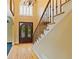 Grand foyer with wrought iron staircase at 615 Lovinggood Trl, Woodstock, GA 30189