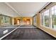 Spacious living room with large mirrors and windows at 615 Lovinggood Trl, Woodstock, GA 30189