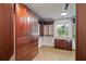 Walk-in closet with natural light, built-in storage, and hardwood cabinets at 615 Lovinggood Trl, Woodstock, GA 30189